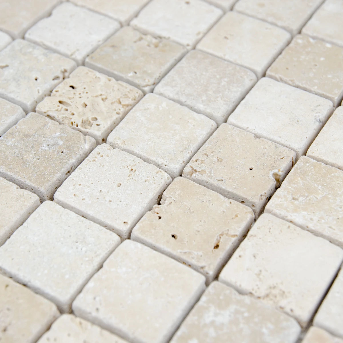 Texture grain travertin ivoire mosaïque surface relief pierre naturelle
