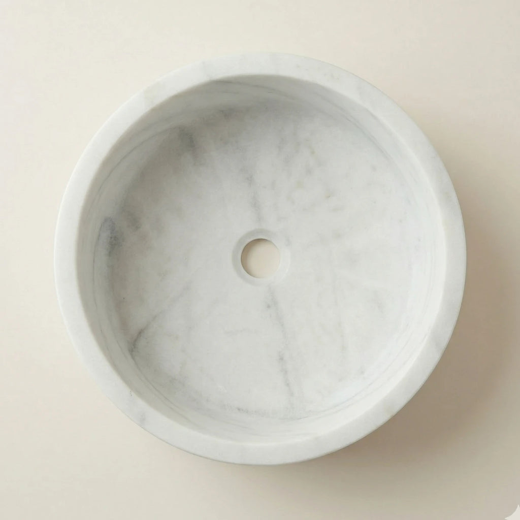 Vasque en marbre blanc ronde pour salle de bain vue de haut