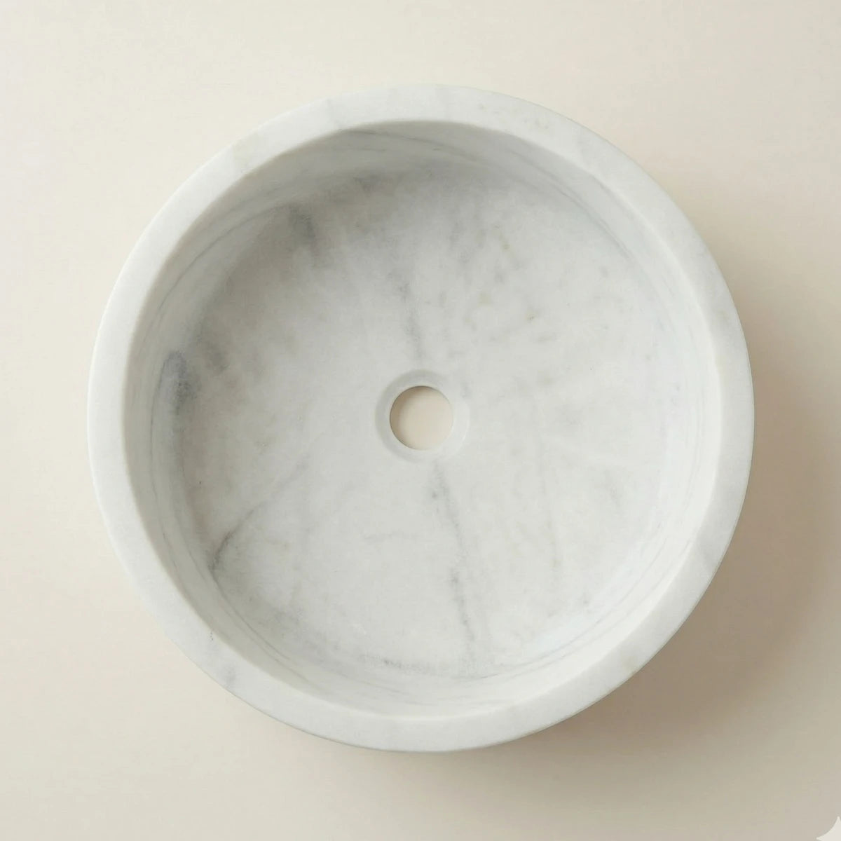Vasque en marbre blanc ronde pour salle de bain vue de haut