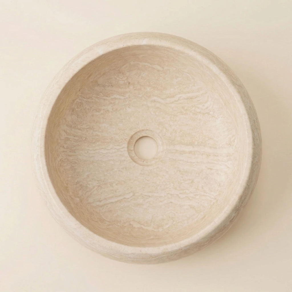 Vasque en travertin ronde pour salle de bain vue de haut